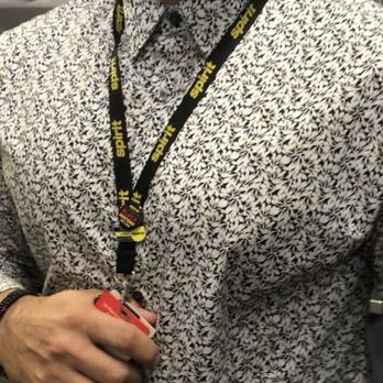Spirit Airlines - He was really trying to hide that badge - Airlines Near Me - Carolina, Puerto Rico