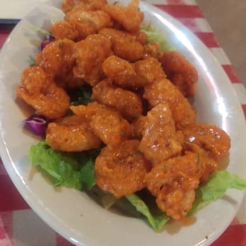 Mulate's - My friend ordered creole shrimp with bourbon sauce. It was okay - Cajun/Creole Near Me - New Orleans, Louisiana