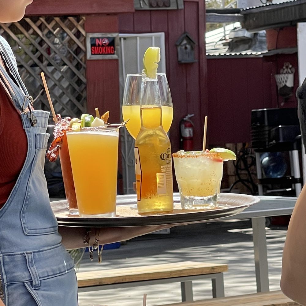 Longbranch Saloon - a waitress serving drinks - Burgers Near Me - Creston, California Longbranch Saloon - a waitress serving drinks - Burgers Near Me - Creston, California