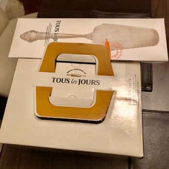 Tous Les Jours - The box goes with a disposable knife 2 match stick and a couple of slim candles. - Bakeries Near Me - Beaverton, Oregon Tous Les Jours - The box goes with a disposable knife 2 match stick and a couple of slim candles. - Bakeries Near Me - Beaverton, Oregon