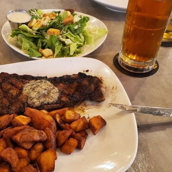 Gella's Diner & Lb Brewing - Kansas stip steak, red potatoes and Cesar salad, plus beer - American Near Me - Hays, Kansas Gella's Diner & Lb Brewing - Kansas stip steak, red potatoes and Cesar salad, plus beer - American Near Me - Hays, Kansas