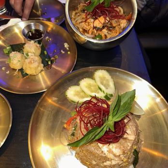 At Nine Restaurant & Bar - Kanom Jeep Chicken Dumplings ( Steamed Chicken Dumplings), Spicy Basil Fried Rice, Spicy Pad Udon - Thai Near Me - New York, New York At Nine Restaurant & Bar - Kanom Jeep Chicken Dumplings ( Steamed Chicken Dumplings), Spicy Basil Fried Rice, Spicy Pad Udon - Thai Near Me - New York, New York