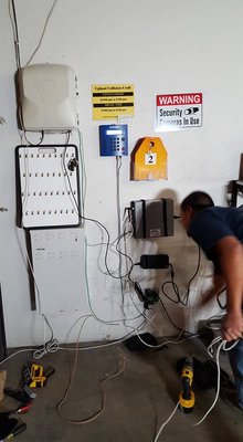 Photo of 3Packet.com - Anaheim, CA, US. Phone System install with FIOS box (top left). The grey box is the phone system, below it its power supply.