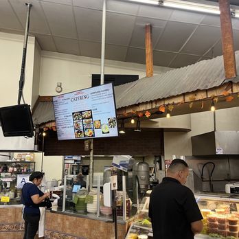 La Cocina At Ranch Market - customers ordering food - Mexican Near Me - Redlands, California La Cocina At Ranch Market - customers ordering food - Mexican Near Me - Redlands, California