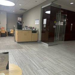 Providence Medical Group-Mercantile - Waiting area. Lobby. Check-in. Clean, well-lit, spacious, modern. Elevator-only access to 3rd floor.