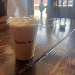 Aurora Coffee - iced vanilla latte with bible verse