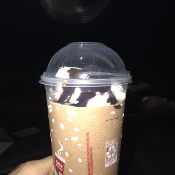 McDonald's - a hand holding a cup of coffee - Fast Food Near Me - Hackettstown, New Jersey