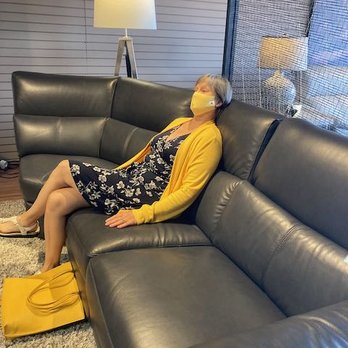 Peerless Furniture - Therese H. tries out the sectional sofas. - Furniture Stores Near Me - Fairview Heights, Illinois
