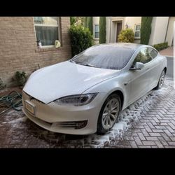 user provided WHAT A GUY CAR DETAILING photo