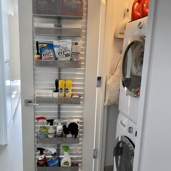 Joyful Nest Home Organizing - Laundry room. The addition of the over-the-door hanger and storage area above the dryer is truly genius. - Home Organization Near Me Joyful Nest Home Organizing - Laundry room. The addition of the over-the-door hanger and storage area above the dryer is truly genius. - Home Organization Near Me