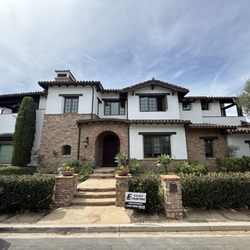 Eguez Painting - Exterior transformation complete. Santa Barbara stucco finished with a clean, elegant look and attention to every detail.
