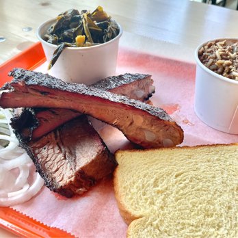 Devil Moon - Ribs and brisket with greens and dirty rice. - Barbeque Near Me - New Orleans, Louisiana Devil Moon - Ribs and brisket with greens and dirty rice. - Barbeque Near Me - New Orleans, Louisiana