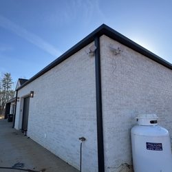 Pitch Perfect Seamless Gutters - Black gutters installed on new home build.