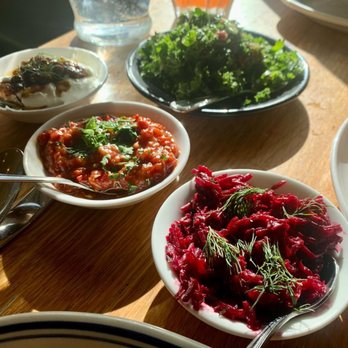 Saba - A few of our starters, the Labneh, Kale Tabbouleh, Roasted eggplant, tomato and peppers and Roasted Beets. - Mediterranean Near Me - New Orleans, Louisiana