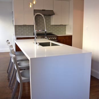 Style Bath & Kitchen - Ceasarstone counter tops with waterfall wrapped ends. - Kitchen & Bath Near Me - Oakland, California Style Bath & Kitchen - Ceasarstone counter tops with waterfall wrapped ends. - Kitchen & Bath Near Me - Oakland, California