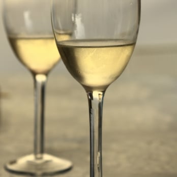 The Wine Garden - two glasses of white wine - Beer, Wine & Spirits Near Me - Lihue, Hawaii The Wine Garden - two glasses of white wine - Beer, Wine & Spirits Near Me - Lihue, Hawaii