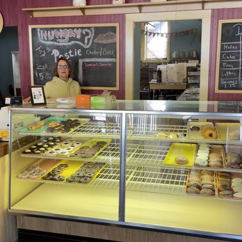 Johnson's Bakery - a man and a woman standing in front of a bakery counter - Bakeries Near Me - Duluth, Minnesota