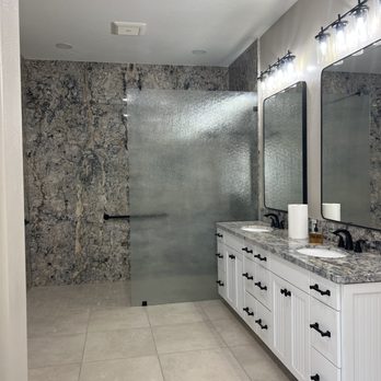 Todd Whittaker Drywall - This gorgeous slab shower is bold and eye-catching. - General Contractors Near Me - Phoenix, Arizona