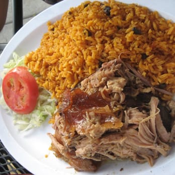 La Bruquena - LECHON Y ARRO CON GANDULE - Puerto Rican Near Me - Chicago, Illinois