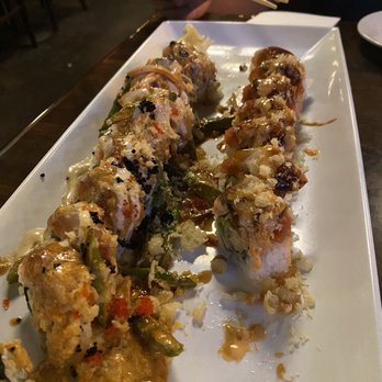 Raw Sushi Bistro - left: tuna steak roll  Right: Spicy Dragon Roll - Sushi Bars Near Me - Modesto, California