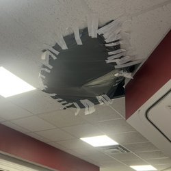 U.S Post Office - This ceiling leak hack had been looming over the service line for over a year.  Nice!