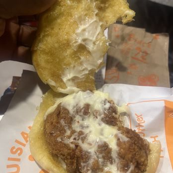 Popeyes Louisiana Kitchen - Bottom of sandwich - Chicken Wings Near Me - Arcadia, Florida