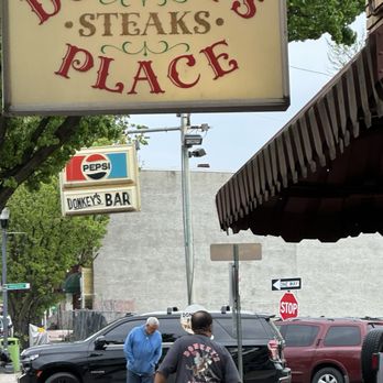 Donkey's Place - Chef walking out at the end of the shift. Last call for cheesesteak 6pm. - Cheesesteaks Near Me - Camden, New Jersey