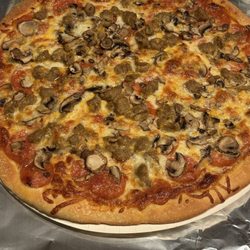 Papa Murphys - Fresh out of the oven pepperoni, sausage and mushroom pizza.