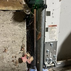 Bay Area Integrity Garage Door Repair - Newly replaced bottom bracket (1 of 2)