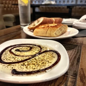 Sorellina - House bread with olive oil. - Italian Near Me - Traverse City, Michigan Sorellina - House bread with olive oil. - Italian Near Me - Traverse City, Michigan