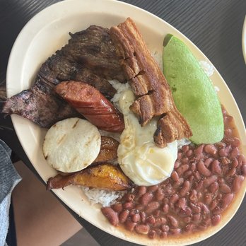 Restaurante Rico Pan - Bandeja Paisa, con Mini Chorizo - Country Platter, with Mini Colombian Sausage - Latin American Near Me - Hialeah, Florida Restaurante Rico Pan - Bandeja Paisa, con Mini Chorizo - Country Platter, with Mini Colombian Sausage - Latin American Near Me - Hialeah, Florida