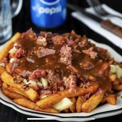 Pete's Pizzeria - Add smoke meat to your poutine definitely a client favourite.