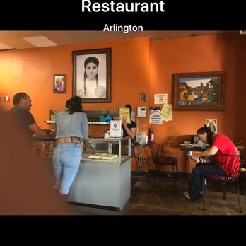 Paula's Mexican Restaurant - Norma trying to hide behind a menu that's not large enough. - Tex-Mex Near Me - Arlington, Texas Paula's Mexican Restaurant - Norma trying to hide behind a menu that's not large enough. - Tex-Mex Near Me - Arlington, Texas