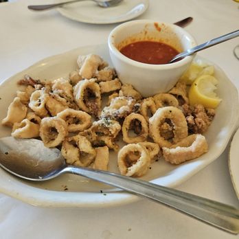 Rini's Restaurant & Wine Bar - Fried calamari appetizer. - Italian Near Me - Elmsford, New York Rini's Restaurant & Wine Bar - Fried calamari appetizer. - Italian Near Me - Elmsford, New York