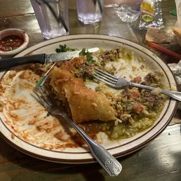 We shared the Fresco burrito wet with divorced sauce . Additionally we each had a Cadillac Margarita & chips and salsa We shared the Fresco burrito wet with divorced sauce . Additionally we each had a Cadillac Margarita & chips and salsa