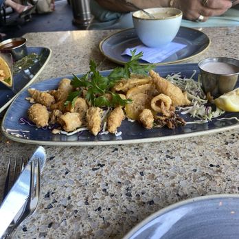 Wence's - Calamari. It gives the impression that there are more than there really are. There are many big pieces of lemon. - New American Near Me - Pleasant Hill, California