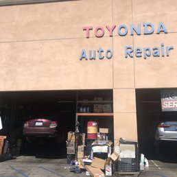 Sean's bays My Accord on left for oil change Sean's bays My Accord on left for oil change