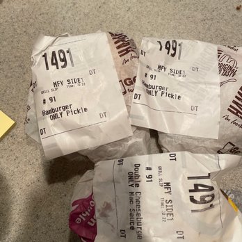 McDonald's - three packages of food on the floor - Fast Food Near Me - Tinley Park, Illinois McDonald's - three packages of food on the floor - Fast Food Near Me - Tinley Park, Illinois