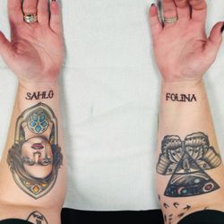 Black Lotus Tattooers - Sahlo Folina on each wrist (by Jarom) and fleabag on my left inner forearm (by David - he has moved shops)