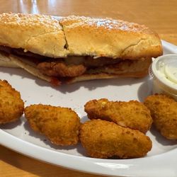 Tyler's Pizza - Chicken Parm Sub with a side of Jalapeño Poppers.