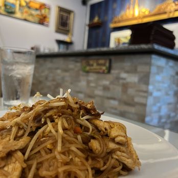 Chill Out Cafe - a plate of noodles and a glass of water - Thai Near Me - New Orleans, Louisiana