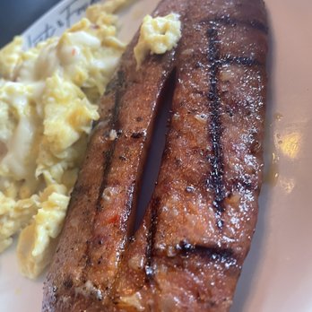 Lost & Found - Eggs and 2 Fried eggs with Andouille Sausage Brunch - Cocktail Bars Near Me - Houston, Texas