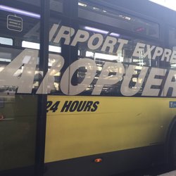 Aeropuerto Express Autobus - Yellow exterior bus paint color
