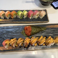 Rainbow roll, spicy tuna hand roll, and a shaggy dog roll.