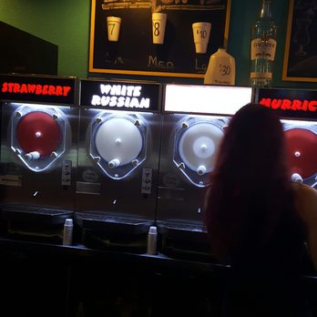 Mango's Daiquiris - a woman in a restaurant - Bars Near Me - Baton Rouge, Louisiana