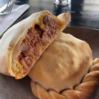Cornish Pasty - Vegan Carne Avovada (Jackfruit) with a side of salsa - Pubs Near Me - Boulder City, Nevada Cornish Pasty - Vegan Carne Avovada (Jackfruit) with a side of salsa - Pubs Near Me - Boulder City, Nevada
