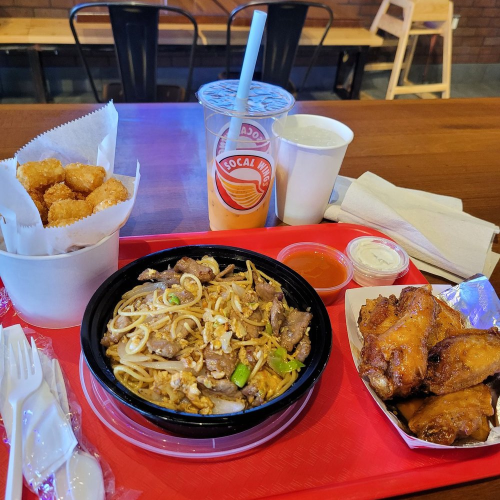 SoCal Wings - Chow mein with beef, Thai tea, wings mango madness flavor, and tater tots with side of Buffalo sauce - Chicken Wings Near Me - Orange, California SoCal Wings - Chow mein with beef, Thai tea, wings mango madness flavor, and tater tots with side of Buffalo sauce - Chicken Wings Near Me - Orange, California