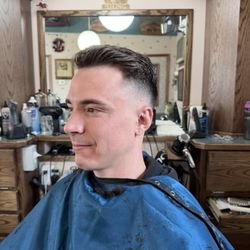 Leisure Way Barber Shop - Mid fade by David Isakson