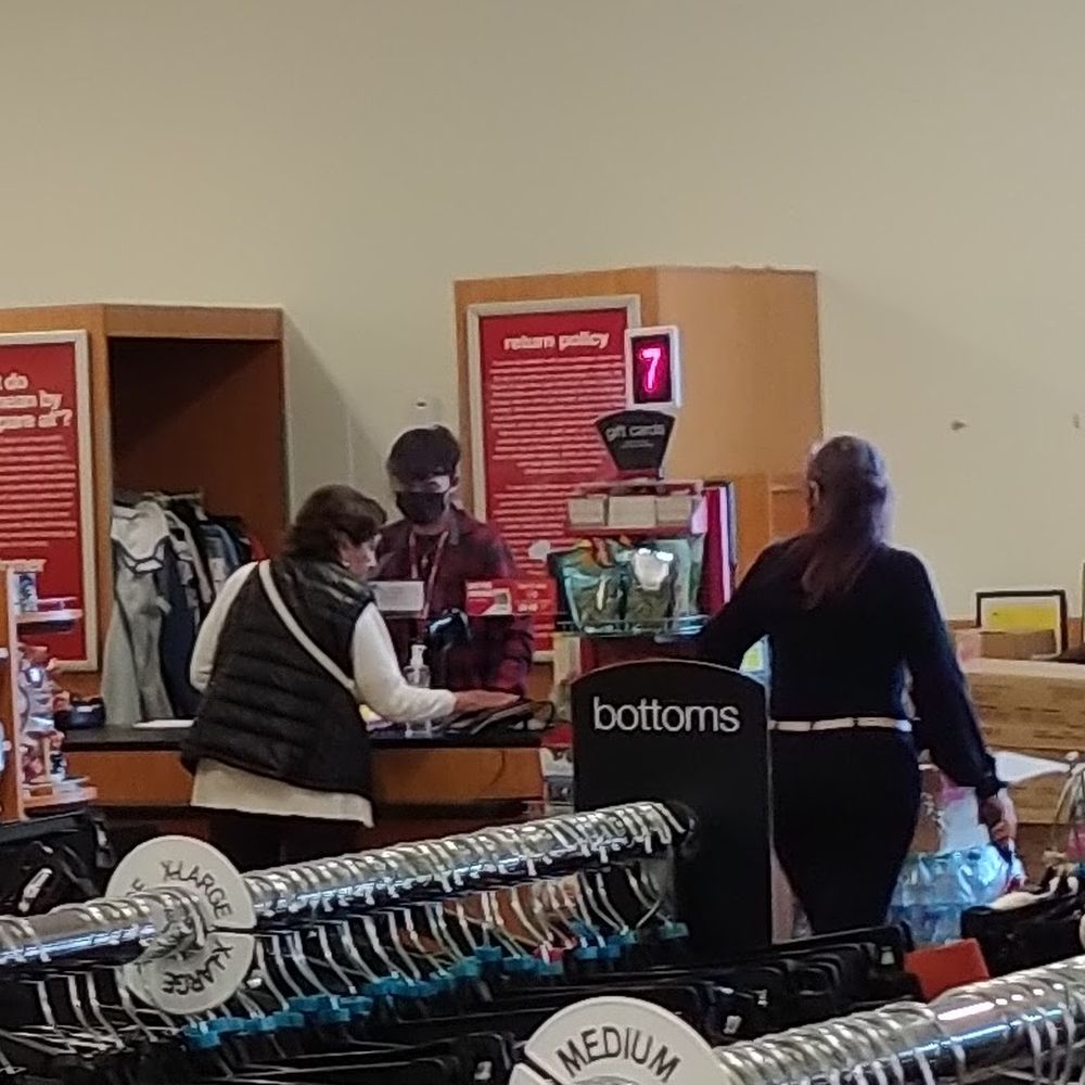 The lady walking towards register 7 is the store manager, Julie B. The filipino man on register 7 is the guy I have to do the return. The lady walking towards register 7 is the store manager, Julie B. The filipino man on register 7 is the guy I have to do the return.