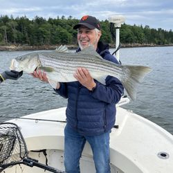 Super Fly Charters - My buddy's striper
